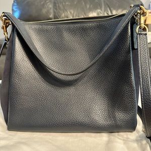 Navy blue Coach bag.